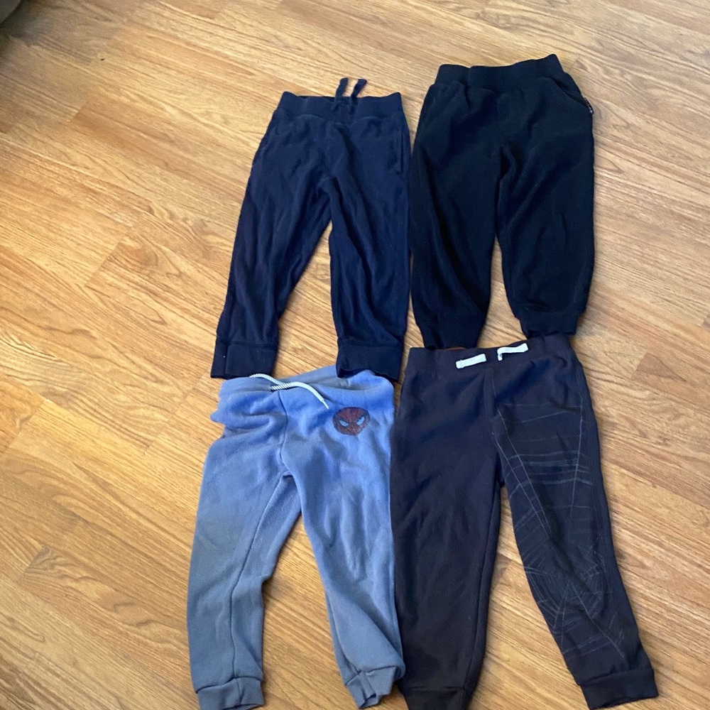 Four pairs of boys size 4T sweatpants.  Basic and comfortable